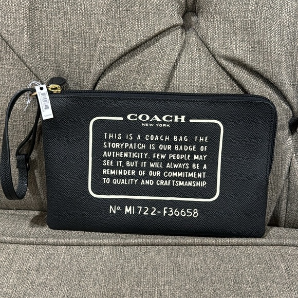 Coach Handbags - NWT coach story patch huge pouch authenticated